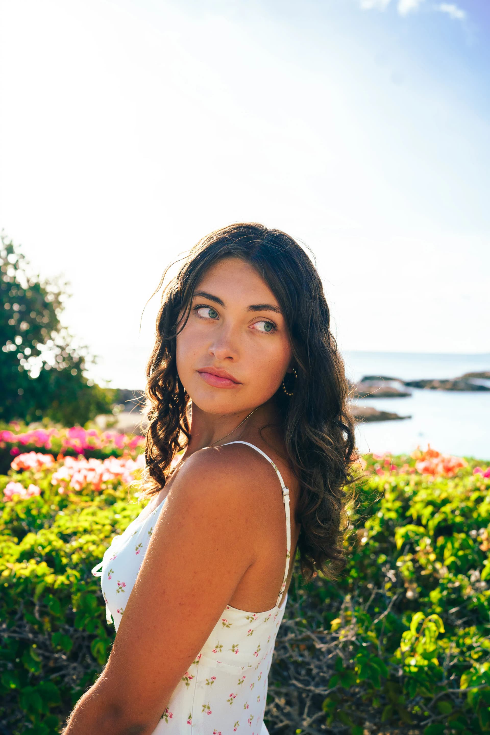 Editorial solo portrait with strong gaze and natural light